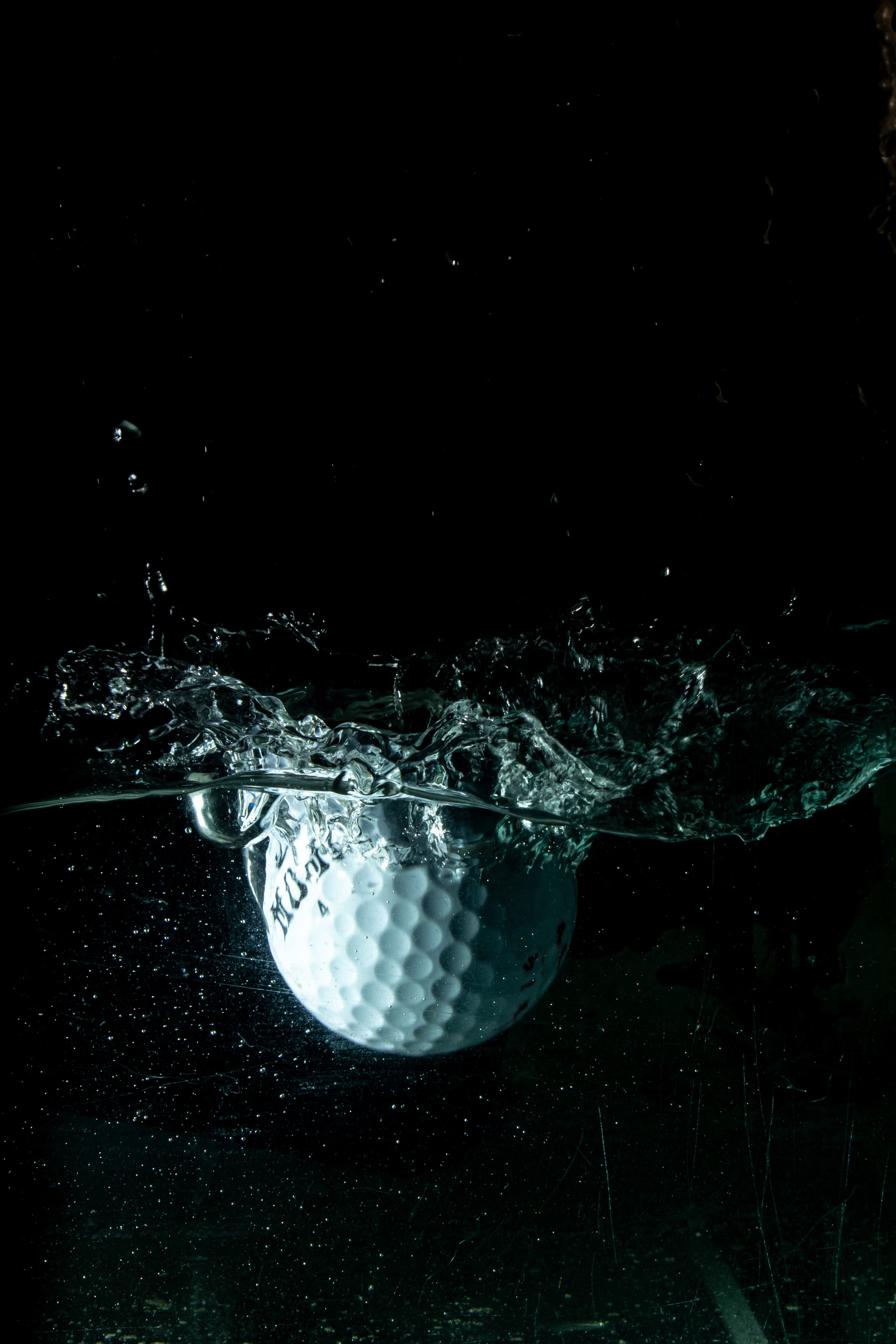 golf ball in water